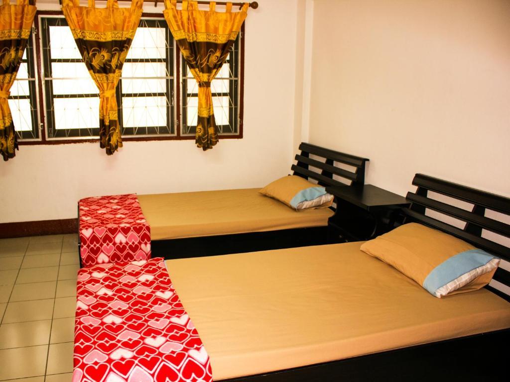 Walkinn Guesthouse 1 Chiang Mai Quarto foto